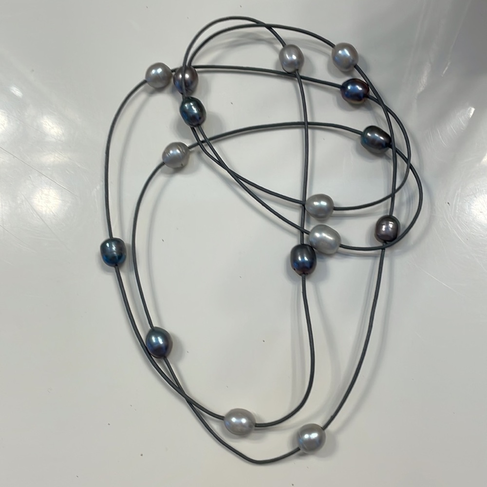 Pearls on a leather string 64” total length